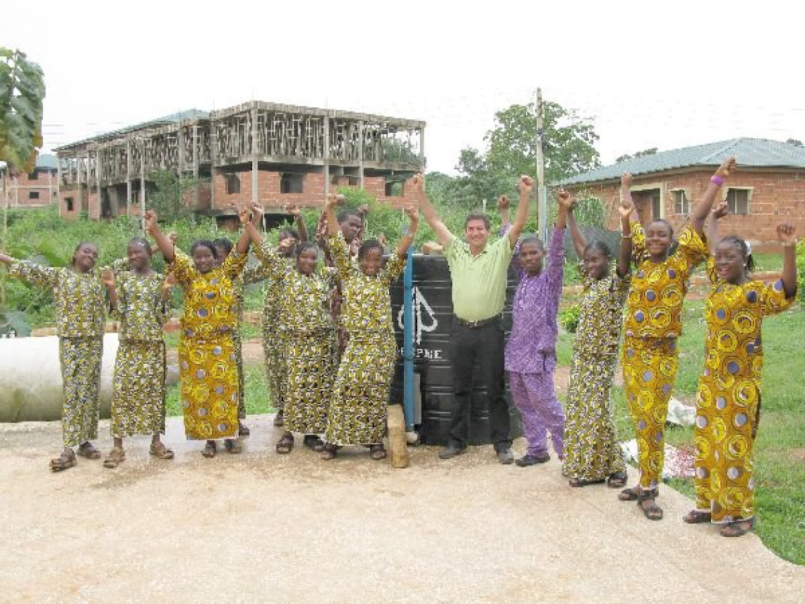 Students at the Bells School Nigeria celebrate the completion of a digestor Bells School Nigeria