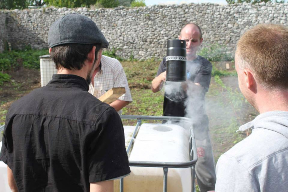 Burning a five inch hole into the IBC tank for a 4 inch uniseal using a 19 Euro stove pipe section. Burning a five inch hole into the IBC tank for a 4 inch uniseal using a 19 Euro stove pipe section.