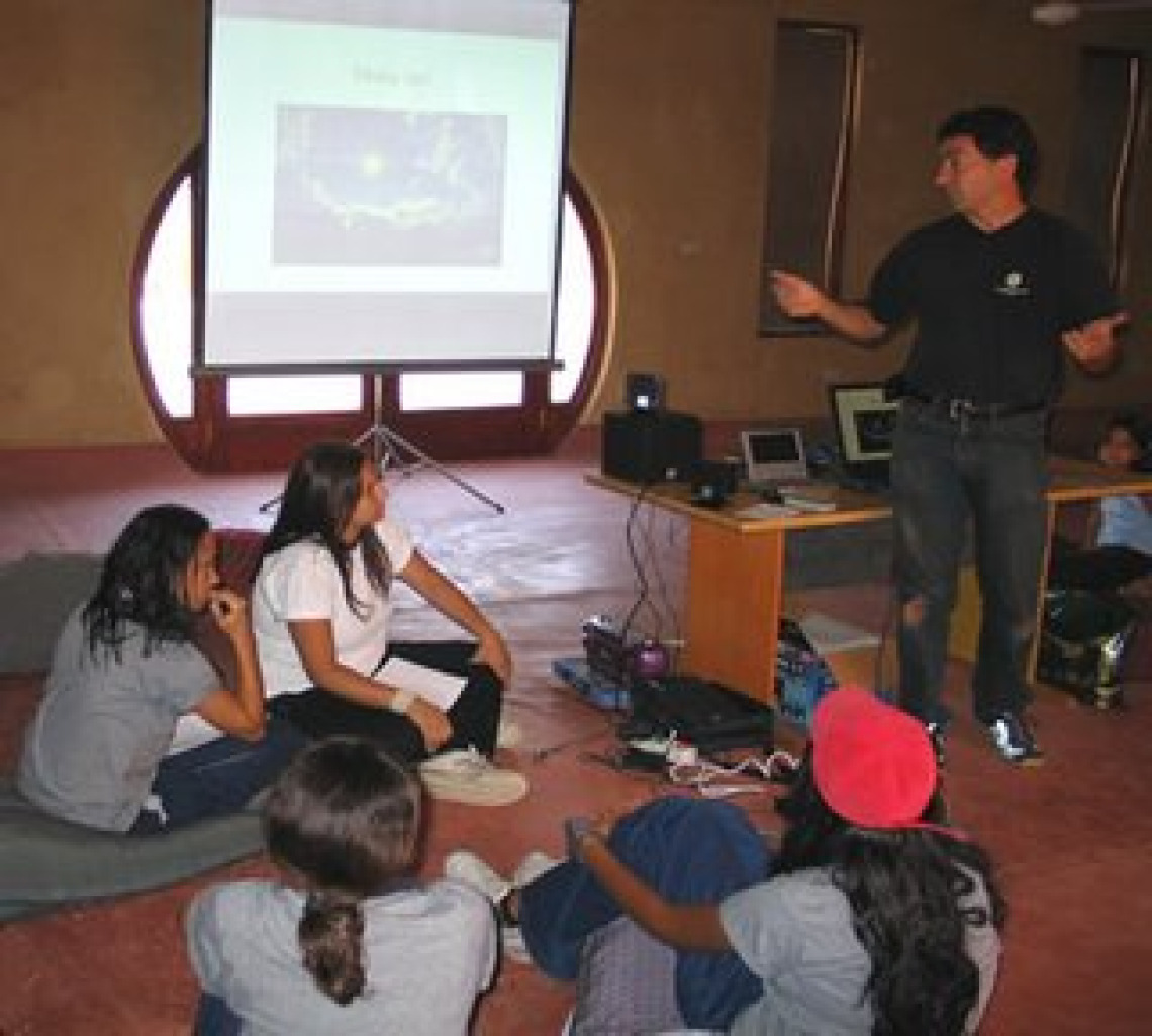 Culhane prepares his presentation for the Cairo Renewable Energy Conference in front of students and staff at the Wadi Environmental Science Center.