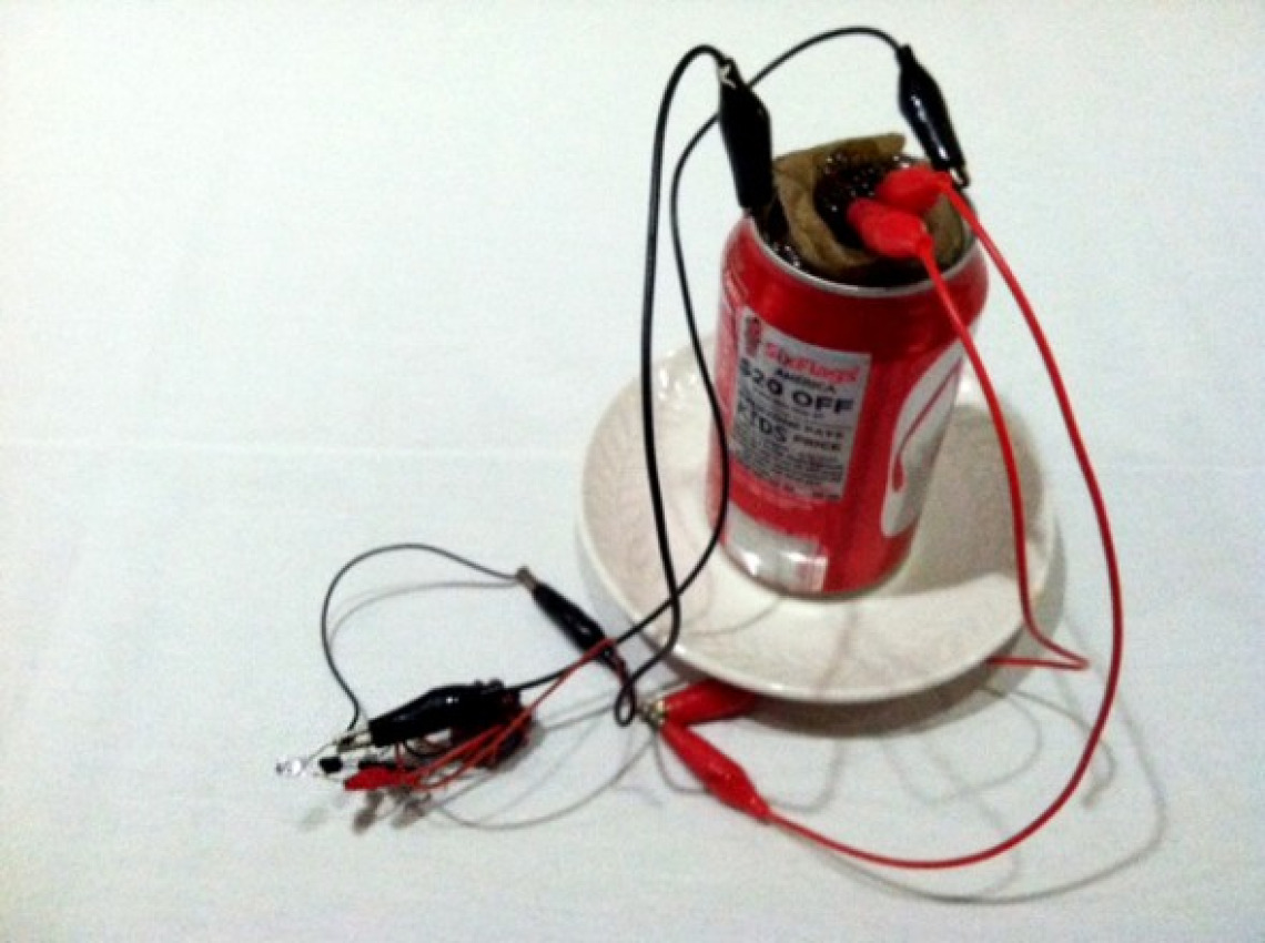 Culhane innovated a useful way to light LEDs using waste aluminum as demonstrated by this coke can coupled to a joule thief circuit